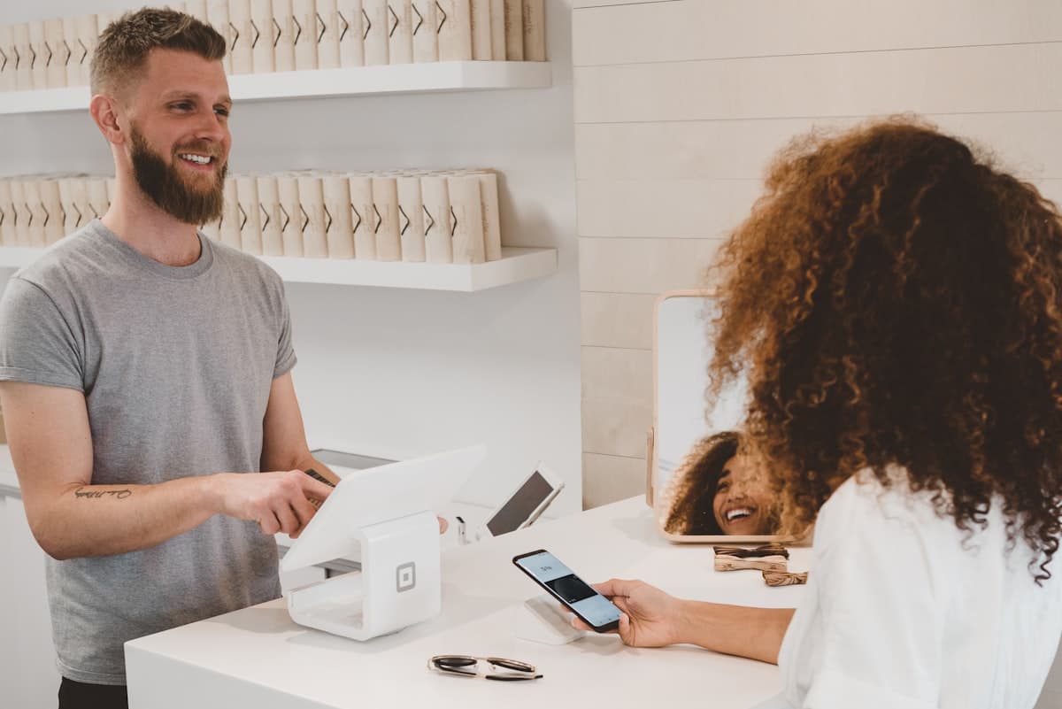 Small business owner packing online orders