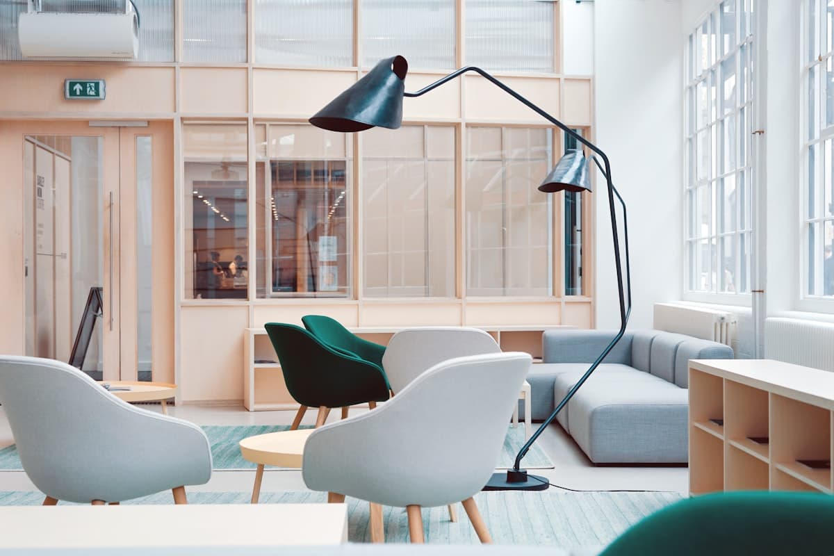 Small business office with desks and laptops